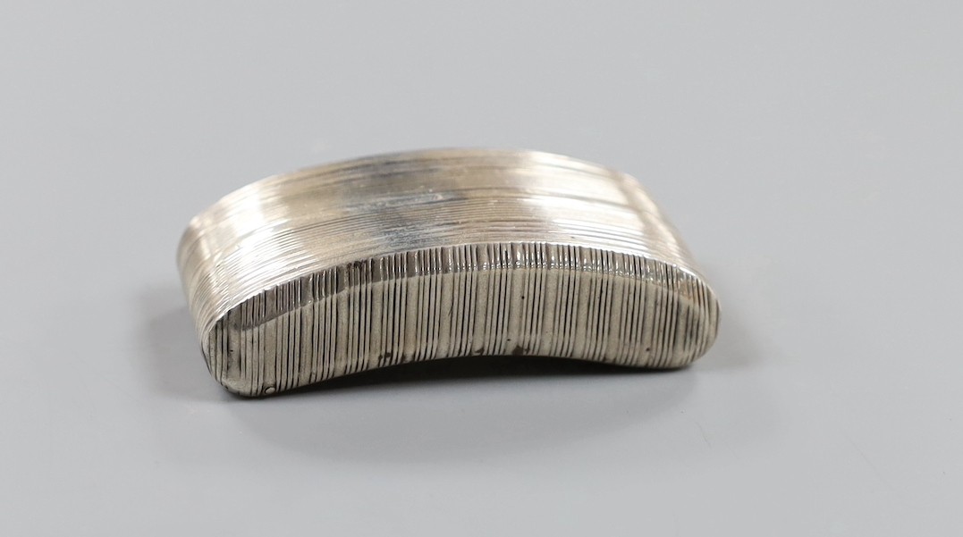 A George III silver concave snuff box, indistinct marks, maker John Linwood?, Birmingham, 18??, 65mm.